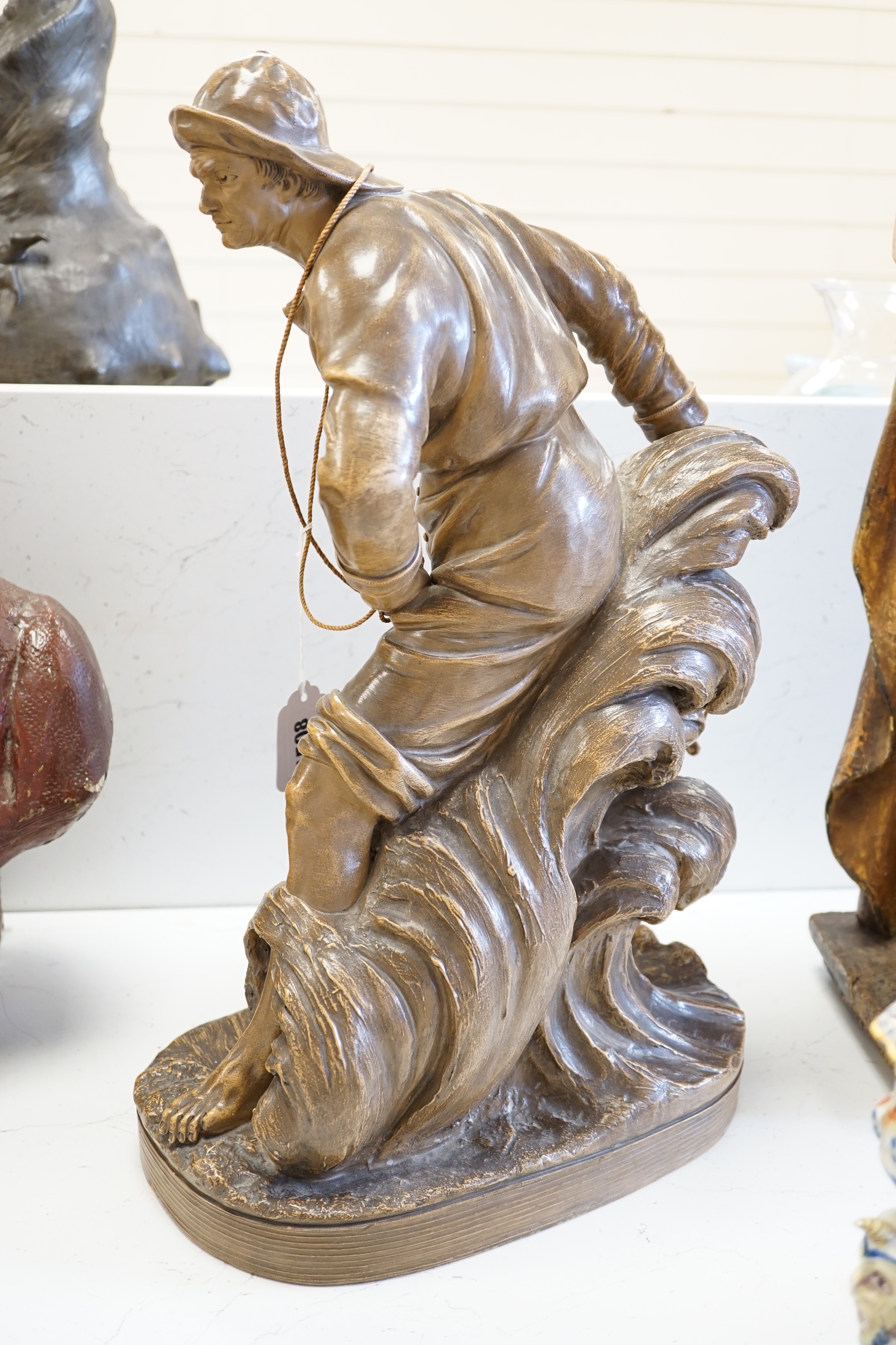 An Art Deco terracotta figure of a seaman - signed Le Guluche, 52cm high
